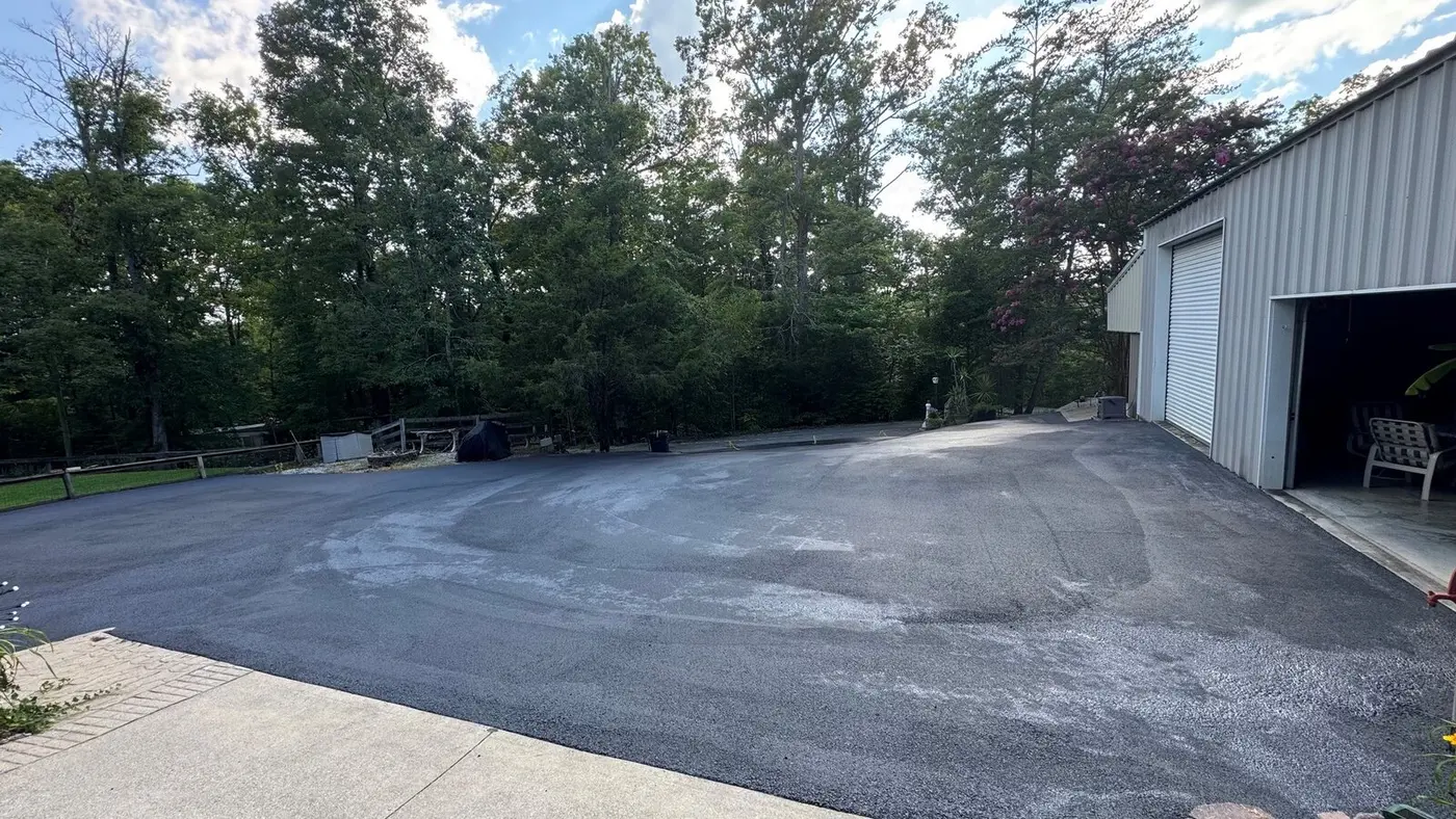 Recently sealcoated asphalt surface